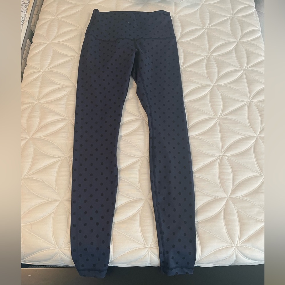 Lululemon women’s leggings, size 8, navy blue with black polka dots